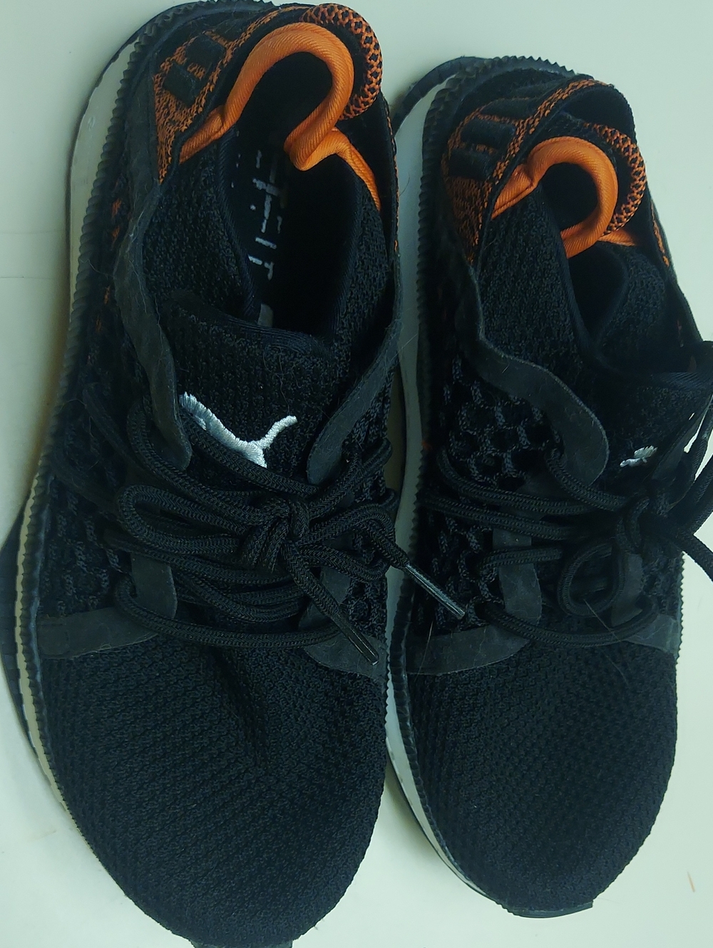 Puma Black Knit Sneakers with Orange Collar Accents